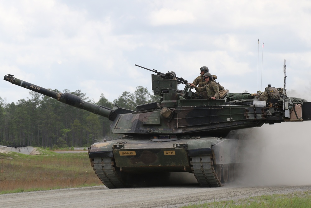 Soldiers from Company B, 1st Battalion, 64th Armor Regiment, 1st Armor Brigade Combat Team, 3rd Infantry Division cunduct gunnery