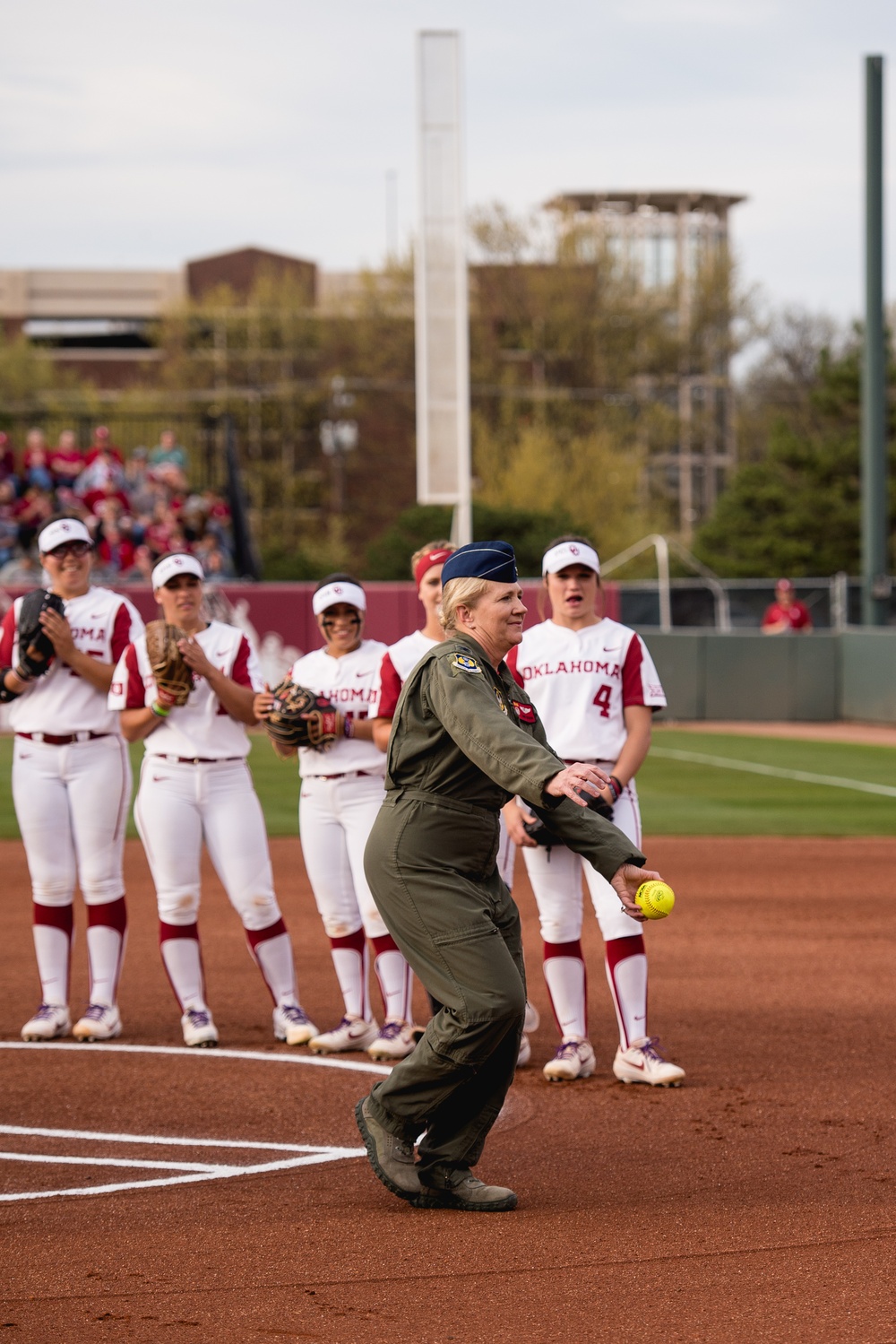 513th Air Control Group Commander throws first pitch for OU Softball