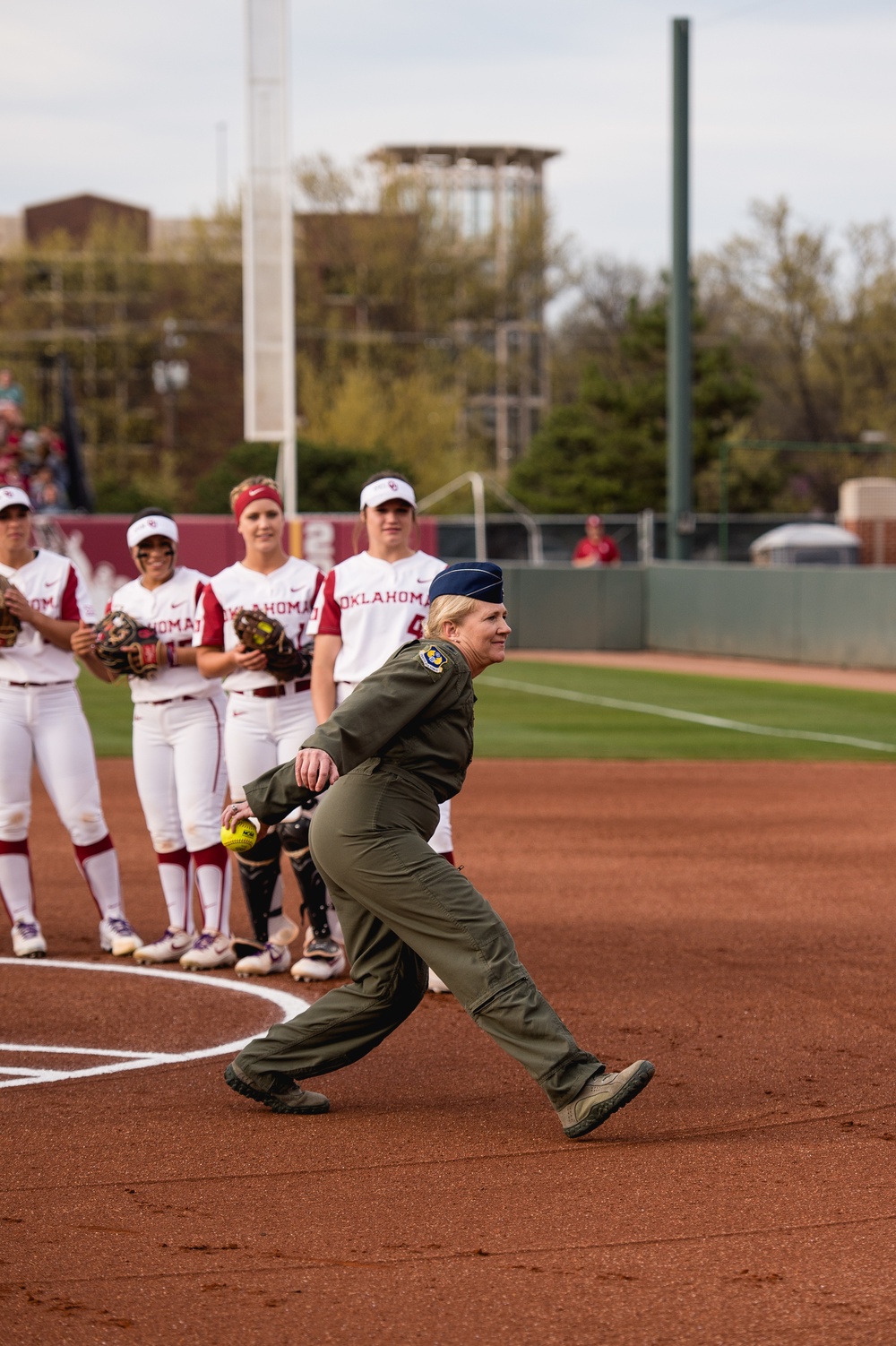 513th Air Control Group Commander throws first pitch for OU Softball