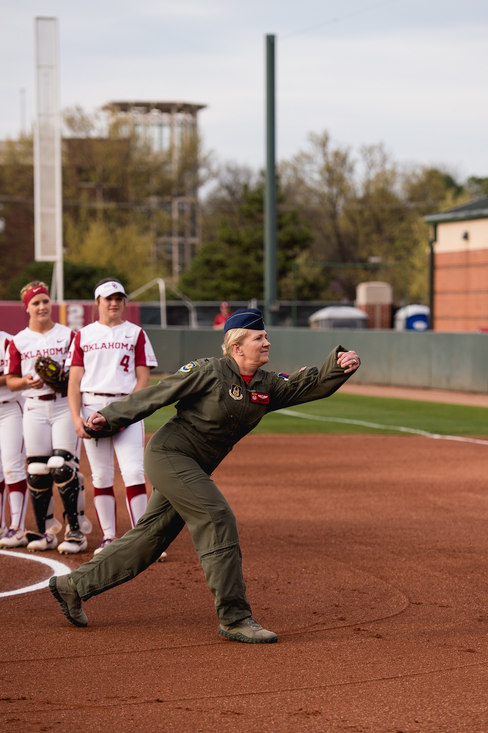 513th Air Control Group Commander throws first pitch for OU Softball