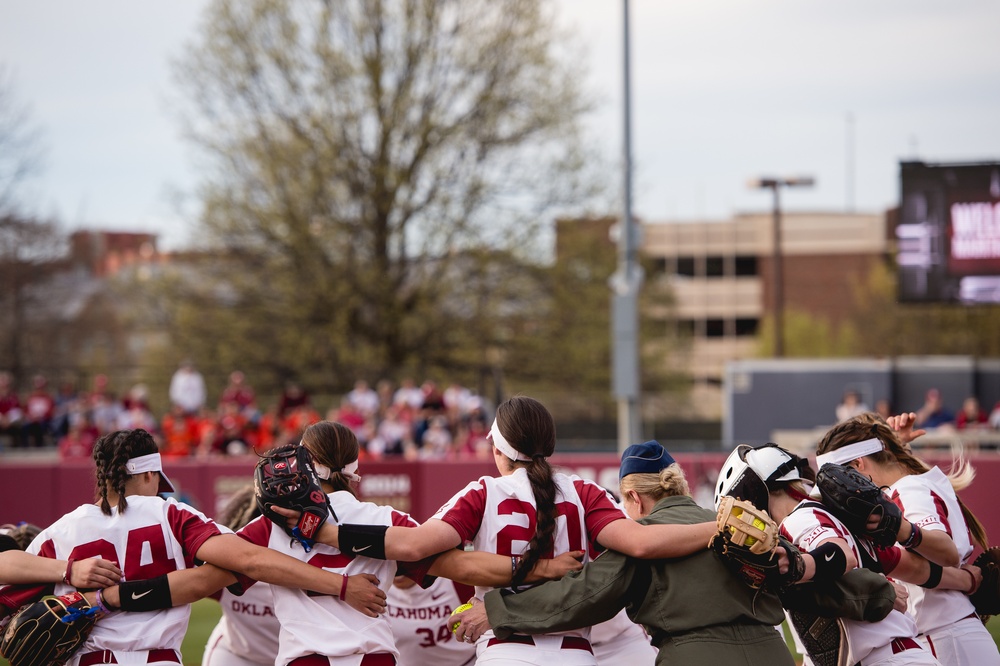 513th Air Control Group Commander throws first pitch for OU Softball