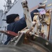 USS Jason Dunham Sailor conducts maintenance