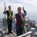 Sailor reenlists on the Aft Mast of the Kearsarge