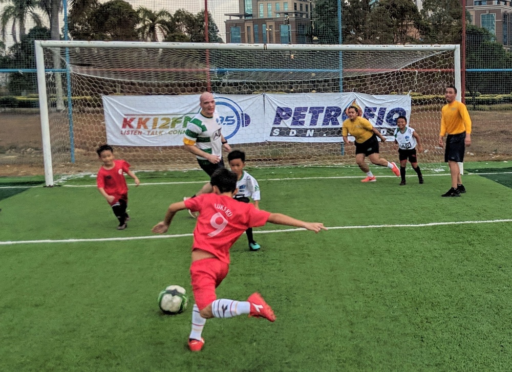 Sailors volunteer at the Seri Mengasih Center during a U.S. 7th Fleet flagship USS Blue Ridge community relations event in Kota Kinabalu, Malaysia