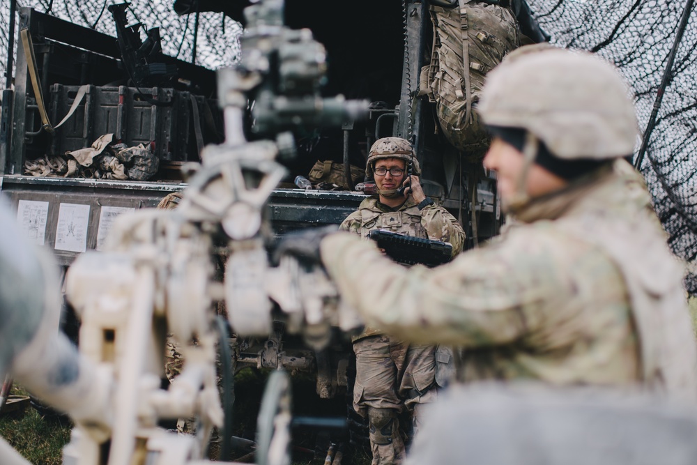 U.S. Army paratroopers acquire a designated firing position