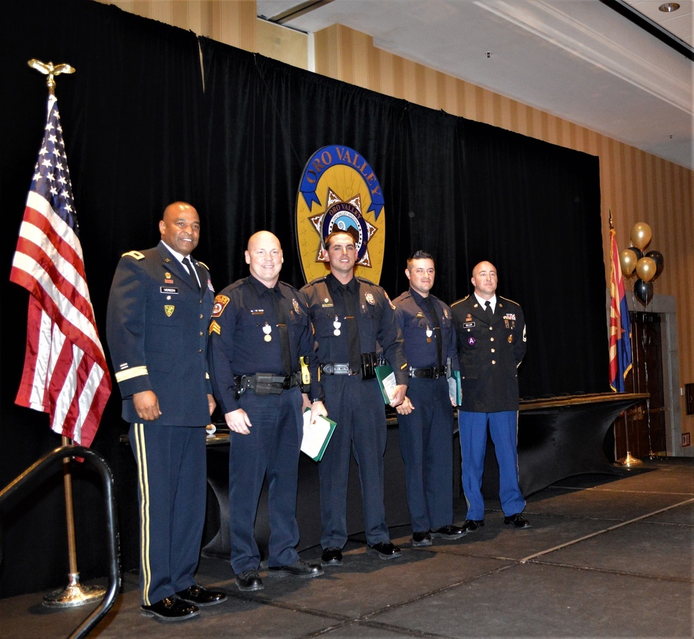 Oro Valley police officers awarded for saving life of Tucson recruiter