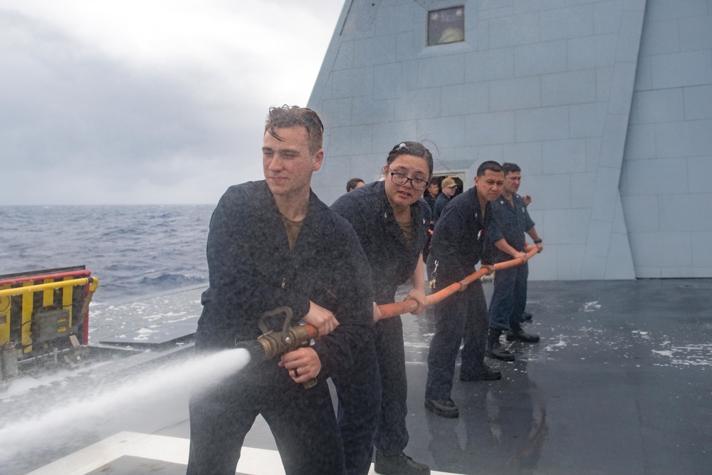Sailors Conduct Hose Handling Training aboard USS Zumwalt