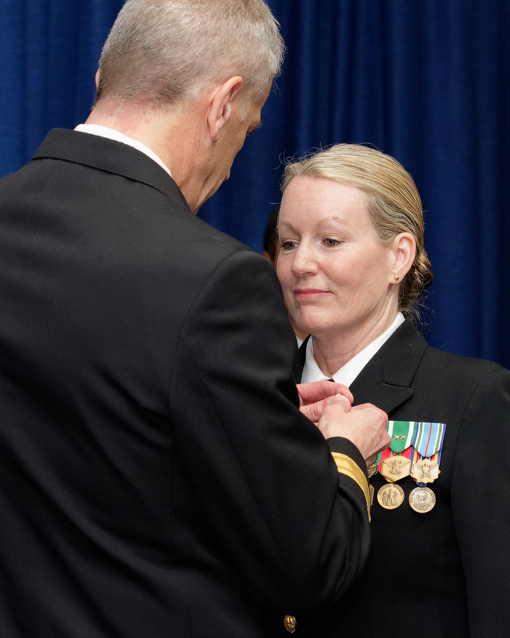 Capt. Lynn Bailey assigned to Navy Medicine West is awarded the Meritorious Service Medal