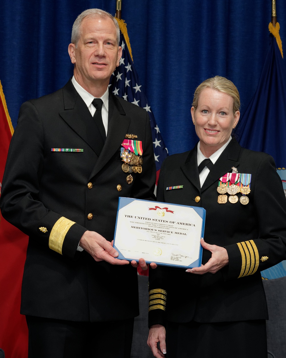 Capt. Lynn Bailey assigned to Navy Medicine West is awarded the Meritorious Service Medal