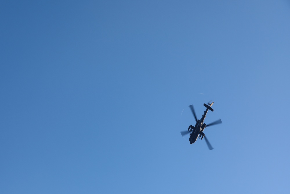 AH-64 Apache attack helicopter provides aerial security during air-assault for Operation Lightning Strike 2019