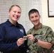 HM3 Gretchen receives her rank from Command Career Counselor, Chief Melissa Goldstein