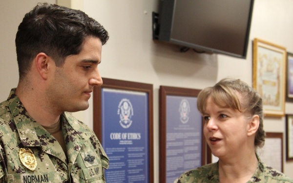 HM1 Kasey Norman, Leading Petty Officer of the Emergency Department, is meritoriously promoted by Commanding Officer, Captain Cynthia Judy