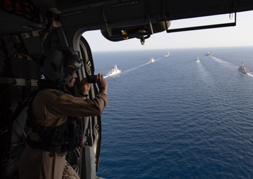 France’s Marine Nationale aircraft carrier FS Charles de Gaulle (R 91) hosts Sailors from the aircraft carrier USS John C. Stennis (CVN 74) while conducting operations at sea