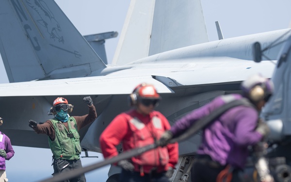 Ships from the John C. Stennis Carrier Strike Group transit the Bab al-Mandeb Strait