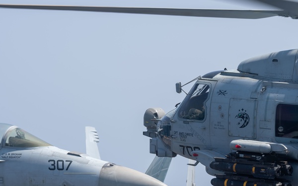 Ships from the John C. Stennis Carrier Strike Group transit the Bab al-Mandeb Strait