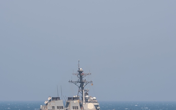 Ships from the John C. Stennis Carrier Strike Group transit the Bab al-Mandeb Strait