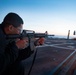 USS Jason Dunham Sailors participate in low-light shoot