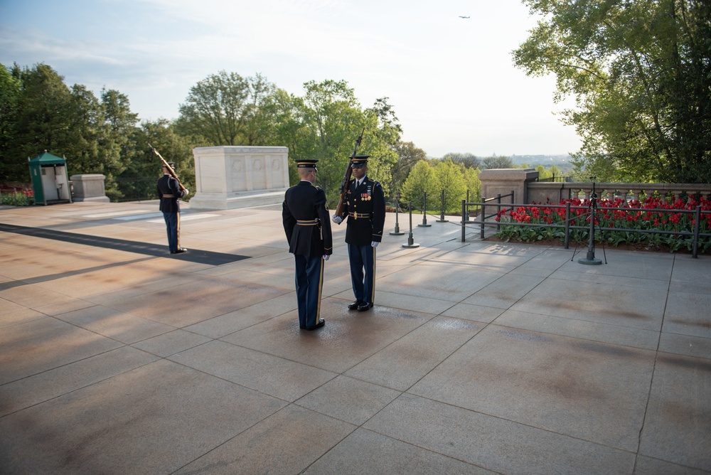 Tomb of the Unknown guard completes final walk, places a single rose at each crypt