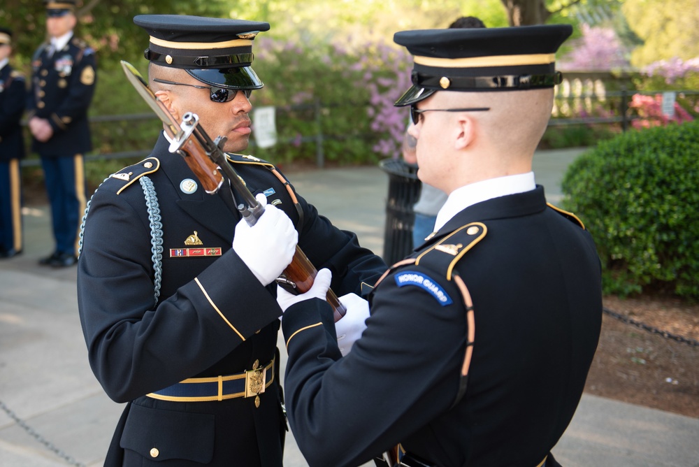 Tomb of the Unknown guard completes final walk, places a single rose at each crypt