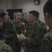 U.S. Marines work with ARDB service members at the Supporting Arms Visual Trainer