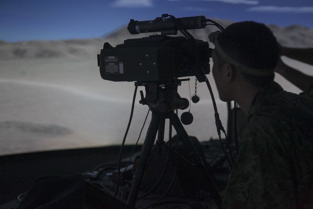 U.S. Marines work with ARDB service members at the Supporting Arms Visual Trainer