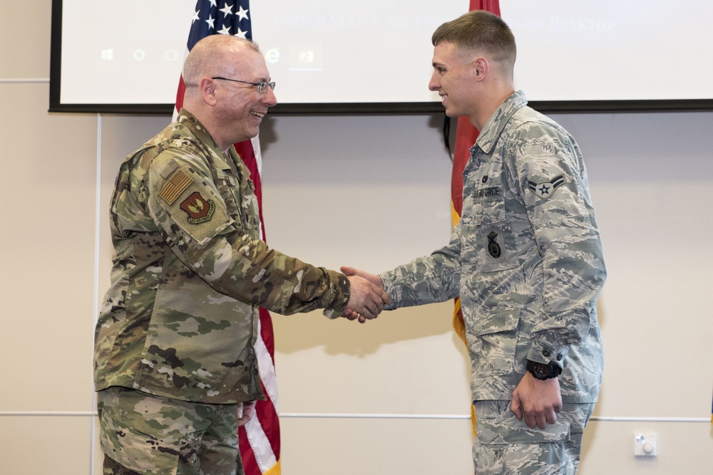 Airman Awarded Superior Performer Coin Following Exercise
