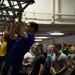 U.S. Sailor participates in a pull-up contest for a Sexual Assault Awareness and Prevention Month