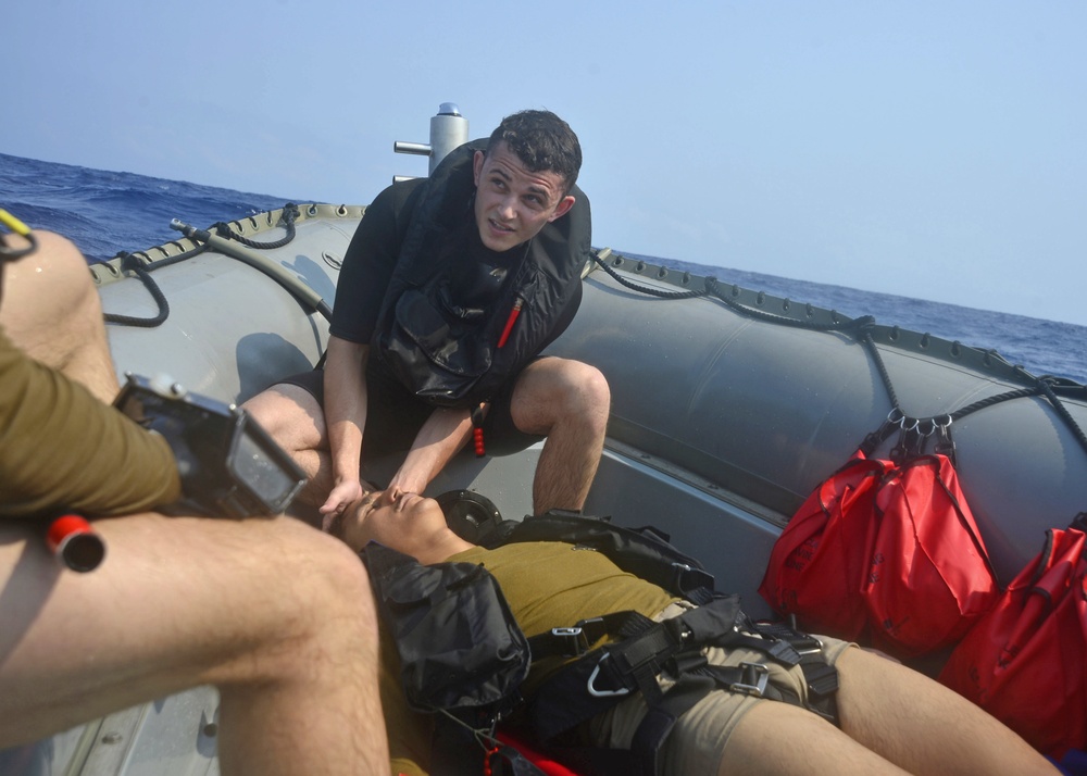 USS Blue Ridge (LCC 19) Conducts Small Boat Operations with Golden Falcons of Helicopter Sea Combat Squadron 12