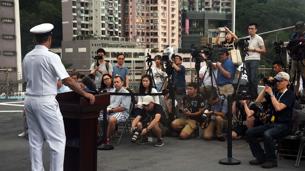 USS Blue Ridge Commanding Officer addresses Hong Kong media representatives.