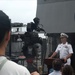 USS Blue Ridge Commanding Officer addresses Hong Kong media representatives.