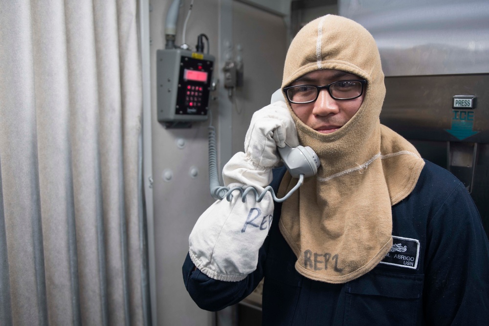 U.S. Sailor Establishes Communications during a GQ Drill aboard USS Spruance