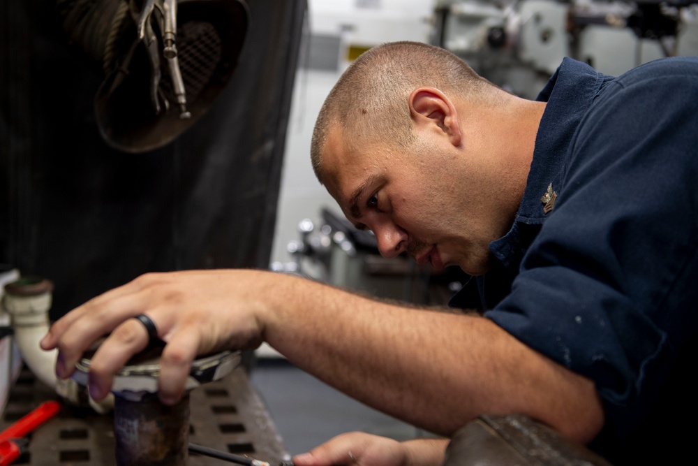 USS Preble Sailors Repair Pipe