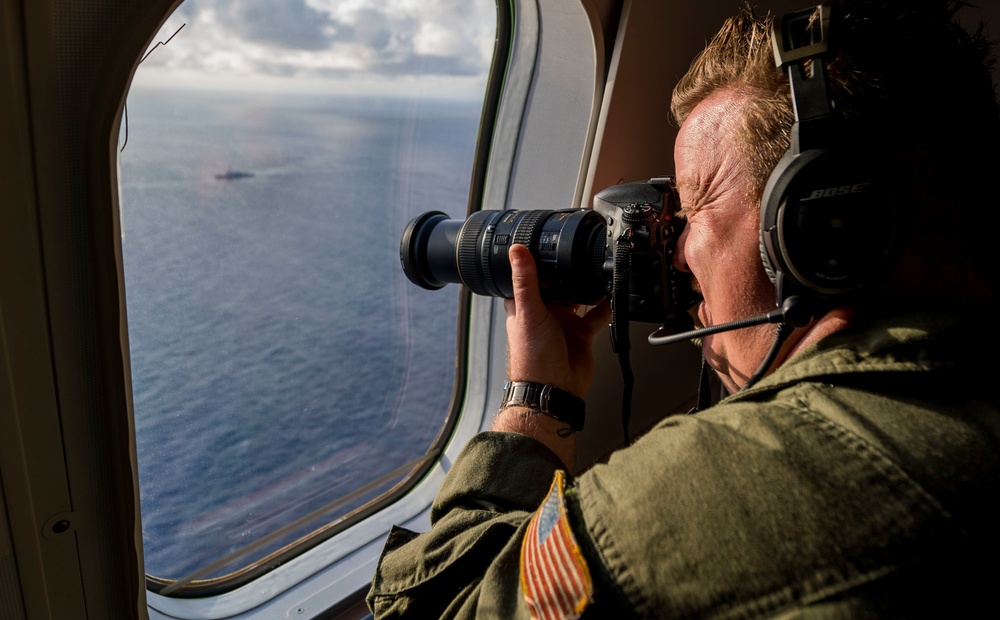 Sri Lanka military members, Commander of Navy Expeditionary Forces Command Pacific fly in a P-8 during CARAT 19