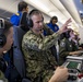 Sri Lanka military members, Commander of Navy Expeditionary Forces Command Pacific fly in a P-8 during CARAT 19