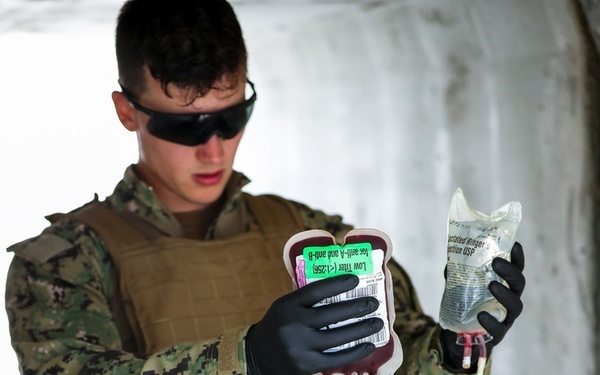 Navy Medic Gives IV