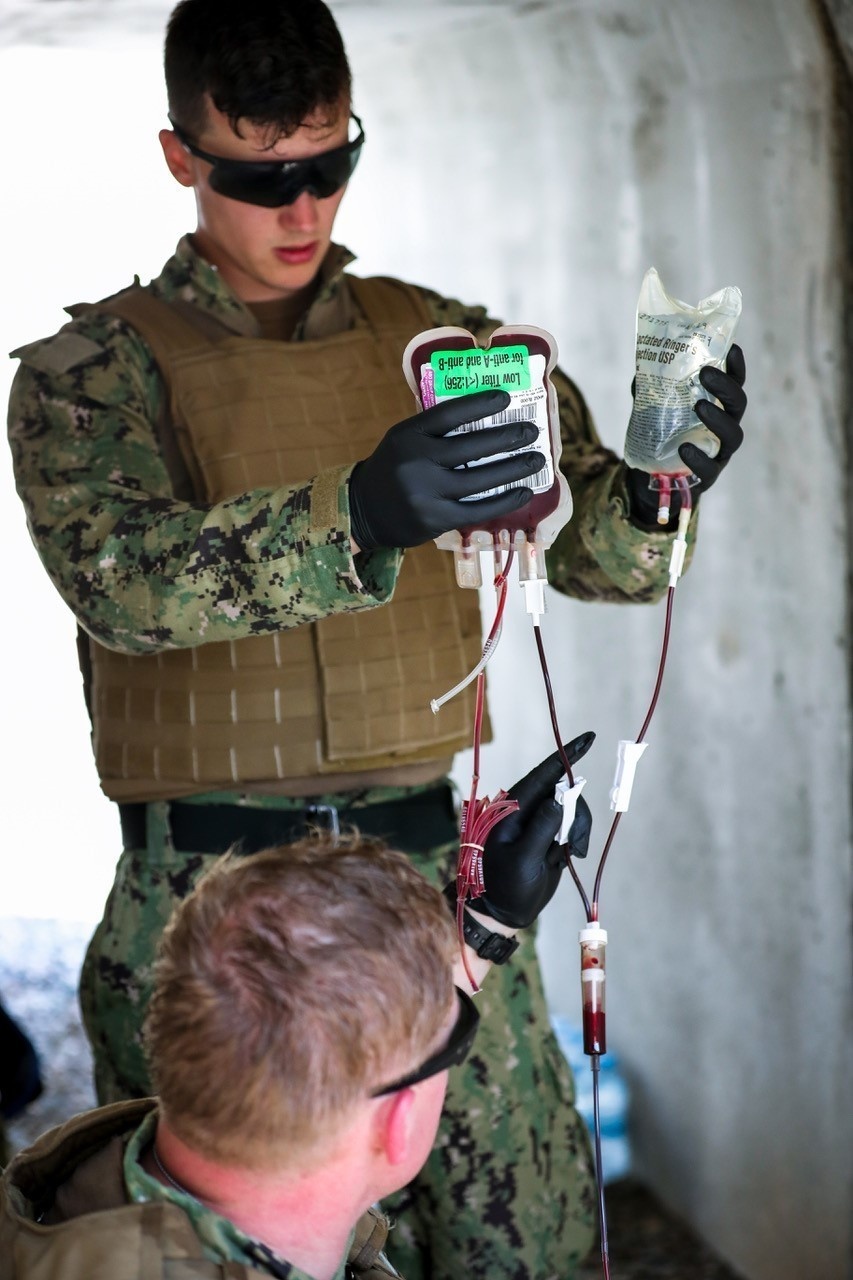 Navy Medic Gives IV