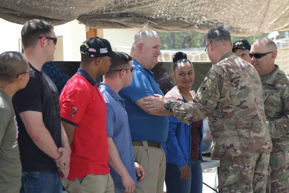 Brig. Gen. Walker Coins Soldiers For Excellence