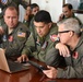 U.S. Air Force Airman and Argentine Air Force Military members partnered up in a joint review of local flight routes