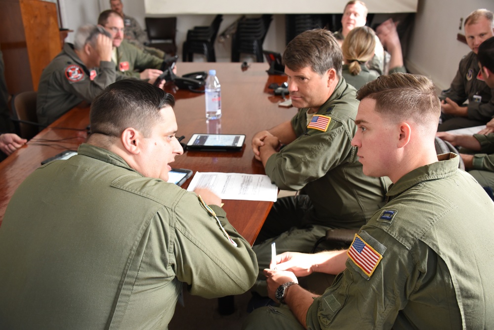 U.S. Air Force Airman and Argentine Air Force Military members partnered up in a joint review of local flight routes