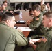 U.S. Air Force Airman and Argentine Air Force Military members partnered up in a joint review of local flight routes