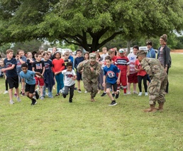 Students, Soldiers help celebrate Old Glory