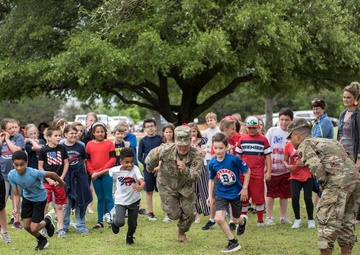 Students, Soldiers help celebrate Old Glory