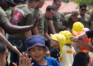 Camp Hansen Marines Volunteer for a friendship exchange and community clean up