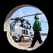 Helicopter Maritime Strike Squadron (HSM) 37, Detachment ONE, perform maintenance on an MH-60R Seahawk