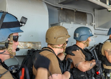 USS Preble And HMAS Melbourne Conduct VBSS Drill During Cooperative Deployment.