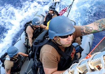 USS Preble And HMAS Melbourne Conduct VBSS Drill During Cooperative Deployment.