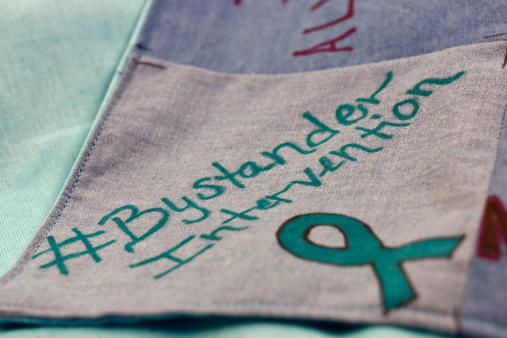 Commando leaders wear teal for Denim Day observance