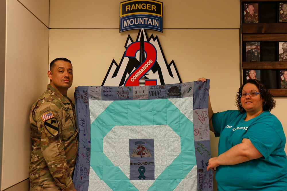 Commando leaders wear teal for Denim Day observance
