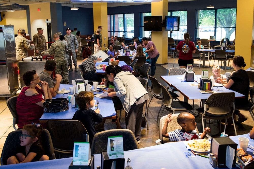 Families come together during deployed spouse dinner