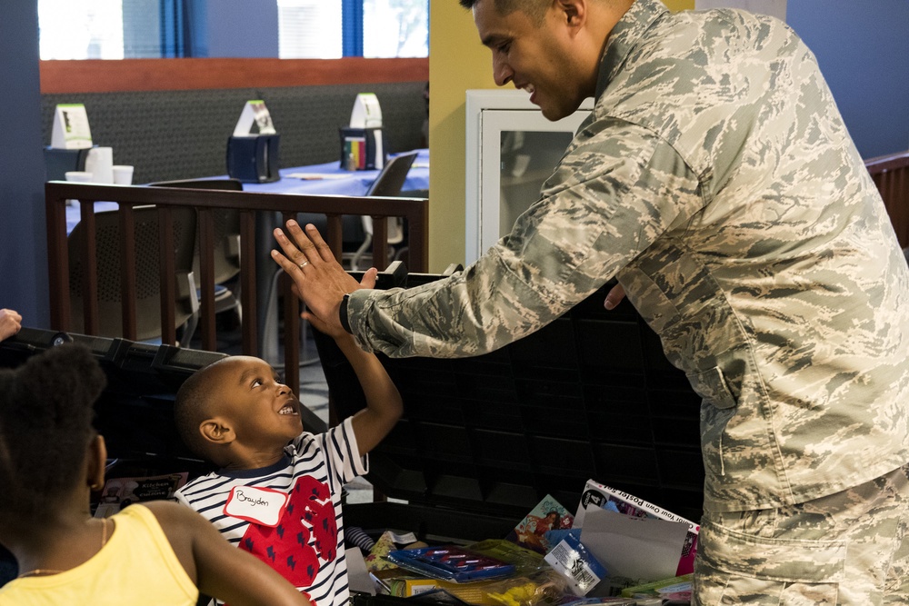 Families come together during deployed spouse dinner